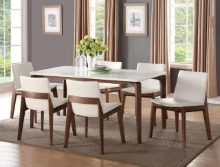 White-top dining table with six upholstered wooden dining chairs