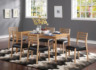 Wooden dining table with six ladder-back chairs and black seats