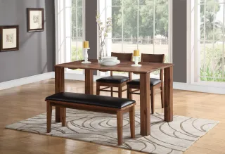 Dark wood dining table with bench and two upholstered chairs