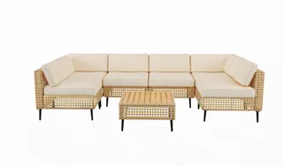 Cream-cushioned woven outdoor sectional with matching coffee table