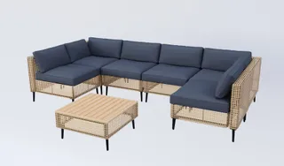 Dark blue woven outdoor sectional with matching coffee table