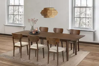 Dark wooden dining table with six upholstered wooden chairs