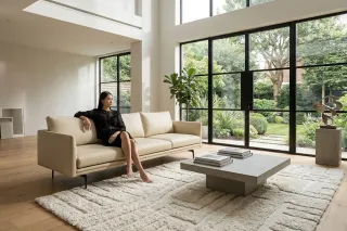 Neutral sofa and square coffee table in a bright modern living room