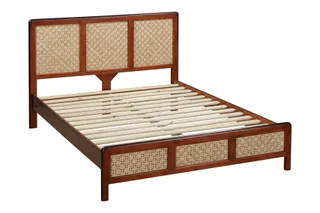 Wooden bed with woven cane panels in the headboard and footboard
