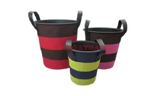 Three striped fabric storage baskets with handles