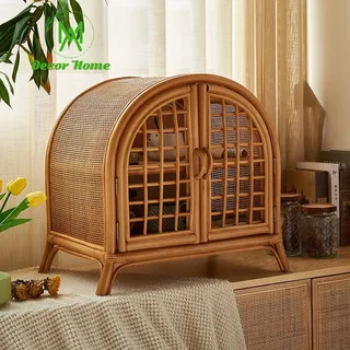 Arched rattan cabinet styled in a bright room