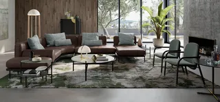 Contemporary living room with brown sectional sofa and round coffee tables