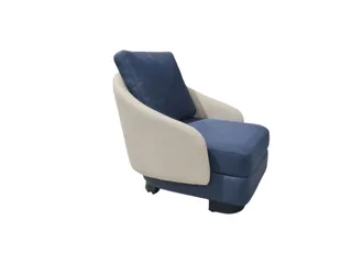 Blue and cream upholstered armchair on a white background