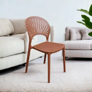Brown perforated dining chair in a living room