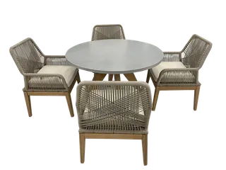 Round outdoor table with four woven dining chairs
