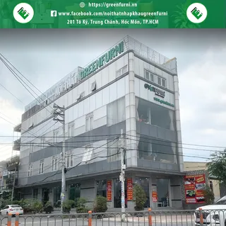 Exterior of Greenfurni-branded furniture building on a city street