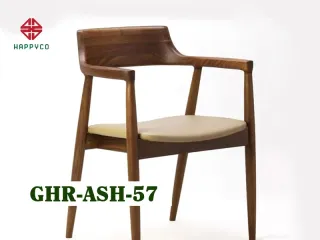 Dark wood armchair with curved back and cream upholstered seat