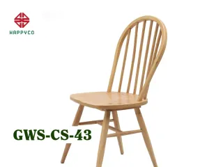 Light wood Windsor-style chair with rounded spindle back
