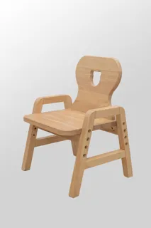 Wooden child chair with shaped backrest