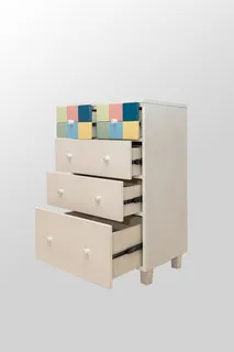 Light wood drawer cabinet with multiple open drawers