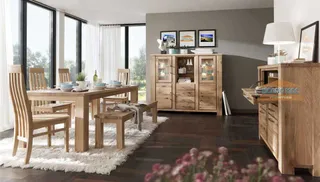 Wooden dining table and chairs with glass-front cabinets and sideboard
