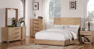 Wood bedroom set with slatted bed, chest of drawers, dressers, and bedside table.