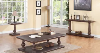Dark wood coffee table and matching console tables in a bright living room.