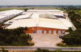 Aerial view of a large furniture manufacturing factory complex