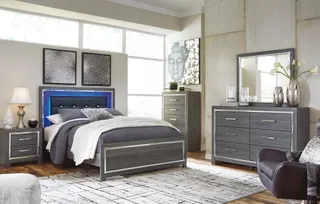 Gray bedroom furniture set with bed, nightstands, dresser, and mirror