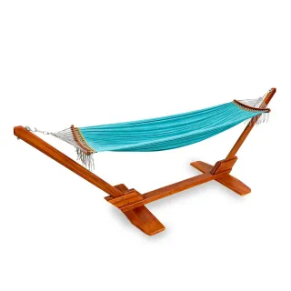 Turquoise hammock suspended from a wooden stand