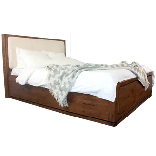Wooden bed with an upholstered headboard and white bedding