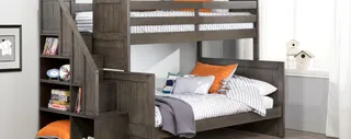 Dark wood bunk bed with integrated shelving and storage compartments