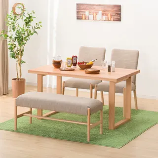 Light wood dining table with upholstered chairs and bench