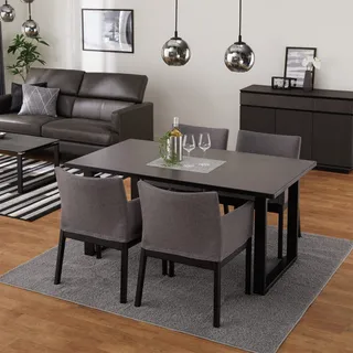 Dark dining table and chairs with matching sofa and sideboard