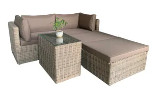 Woven outdoor sofa with matching ottoman and glass-top side table