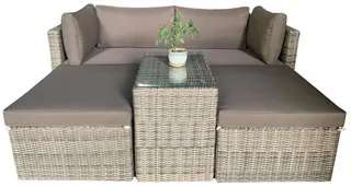 Woven outdoor sofa with two chaise lounges and central glass-top table