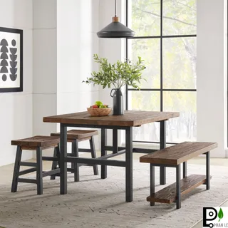 Rustic wood dining table with matching benches and stools in a bright interior.