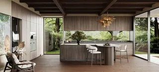 Wood and white kitchen with island, stools and large garden-facing windows