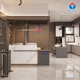 Contemporary kitchen and reception interior with wood cabinetry and marble-front island