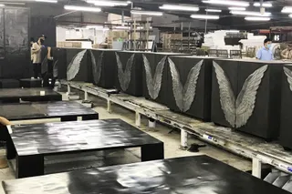 Finished black furniture on a production line inside the factory