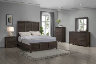Dark wood bedroom set with bed, nightstand, dressers and mirror