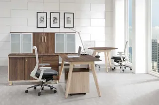 Modern office with desks, storage cabinets and office chairs