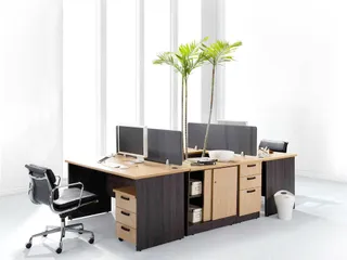 Modular office workstation with desks, drawers, divider panels and chairs