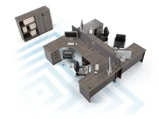 Overhead view of clustered office workstations with desks, cabinets and chairs