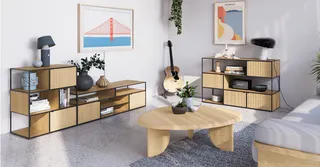 Living room with wooden shelving units, storage cabinets and round coffee table