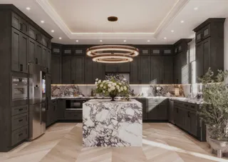 Large dark kitchen with marble island, cabinetry and circular chandelier
