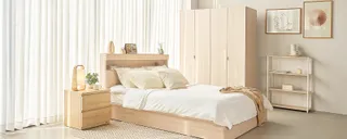 Bedroom with wooden bed, wardrobe, bedside chest and shelving