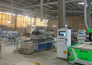 Woodworking machinery and production equipment inside a furniture factory