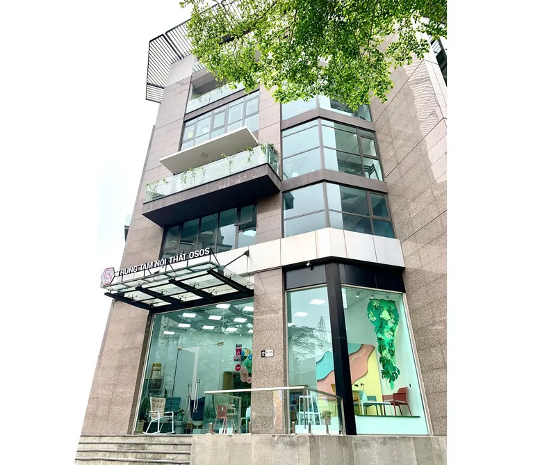 Exterior of a multi-storey TAV office and showroom with glass frontage