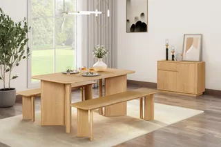 Wooden dining table with bench, stools and matching sideboard.