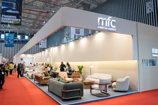 MFC furniture exhibition booth displaying sofas, chairs and tables