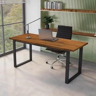 Wood-topped office desk with black metal legs, laptop and office chair.