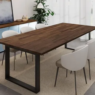 Dark wood dining table with black metal legs and four upholstered chairs.