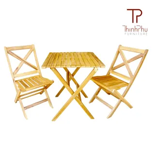 Light wood folding bistro table with two chairs