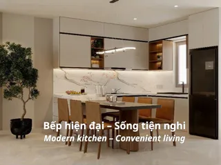 Modern fitted kitchen with white cabinets, island and wooden dining chairs